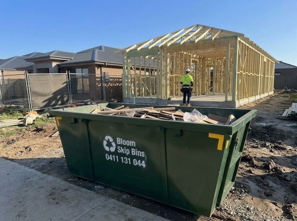 Bloom Skip Bins 8m³ bin on a Melbourne building site during frame stage
