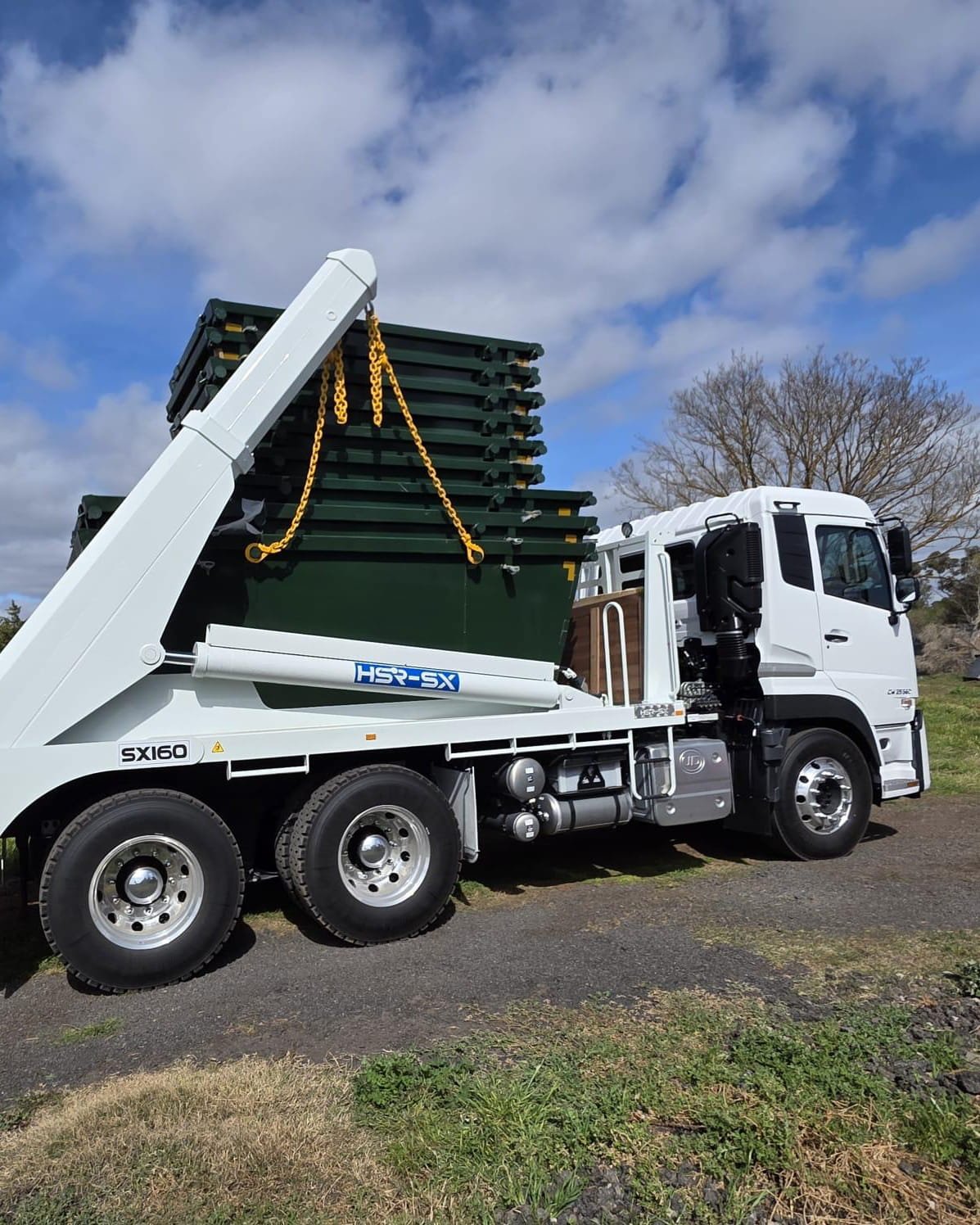 Bloom Skip Bins truck carrying a skip bin in Truganina, Melbourne